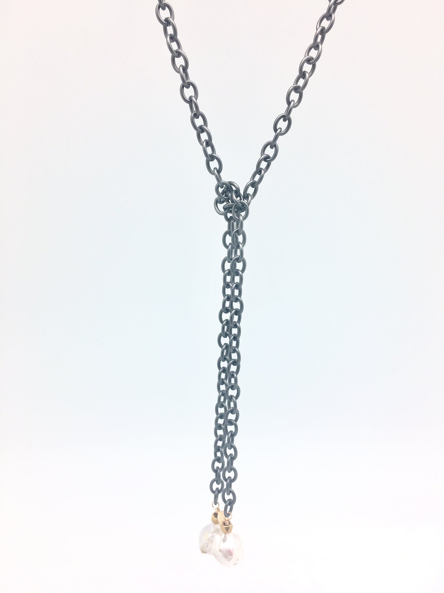 Malin, oxidized lariat